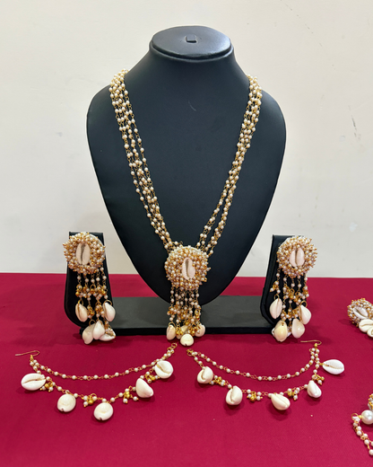 Shell & Pearl Haldi Jewelry Set – Full Bridal Ensemble (Necklace, Bracelet, Kaleera, Earrings, Maang Tikka)